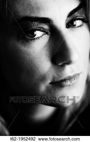 Close-up portrait of a beautiful young blonde. White and black. View Large Photo Image Stock Image - Close-up portrait of a beautiful young blonde. White and black.. Fotosearch