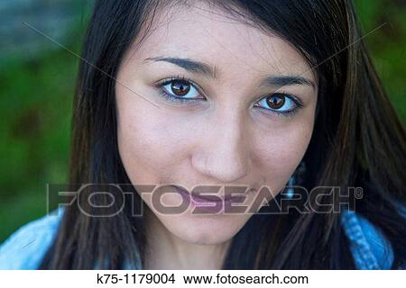 Picture - Close up portrait of a female teenager. Fotosearch