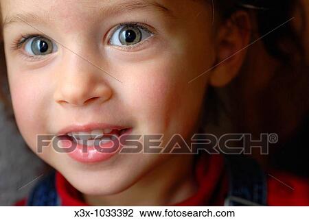 Close up portrait of an enthusiastic little girl View Large Photo Image Stock Image - Close up portrait of an enthusiastic little girl. Fotosearch
