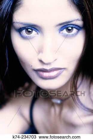 Close-Up Portrait of Exotic Looking Woman View Large Photo Image Stock Image - Close-Up Portrait of Exotic Looking Woman. Fotosearch