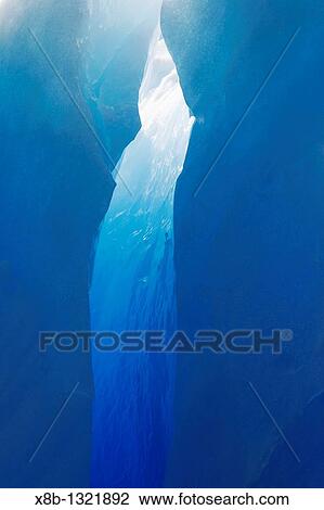 Close-up view of a crevasse in a huge Iceberg calved from the LeConte Glacier just outside Petersburg, Southeast Alaska, USA Pacific Ocean View Large Photo Image Stock Image - Close-up view of a crevasse in a huge Iceberg calved from the LeConte Glacier just outside Petersburg, Southeast Alaska, USA Pacific Ocean. Fotosearch