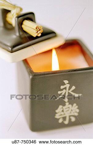 Close_up of a Lit Candle View Large Photo Image Stock Photograph - Close_up of a Lit Candle. Fotosearch