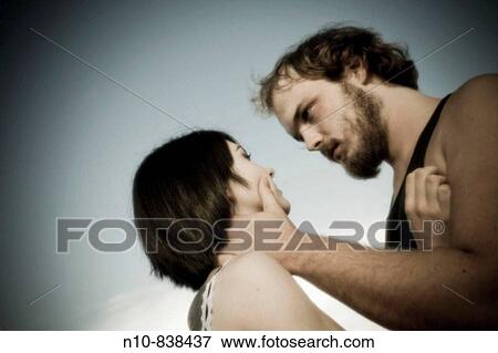Stock Photo - Close_up of a young couple.. Fotosearch