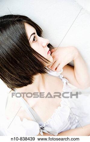Close_up of a young woman. View Large Photo Image Stock Photo - Close_up of a young woman.. Fotosearch