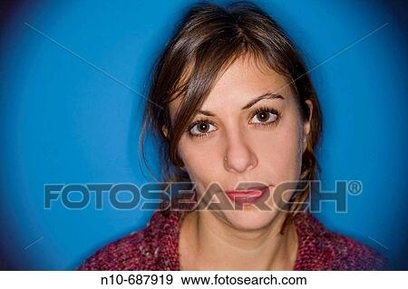 Close_up of a young woman's face. View Large Photo Image Stock Photo - Close_up of a young woman's face.. Fotosearch