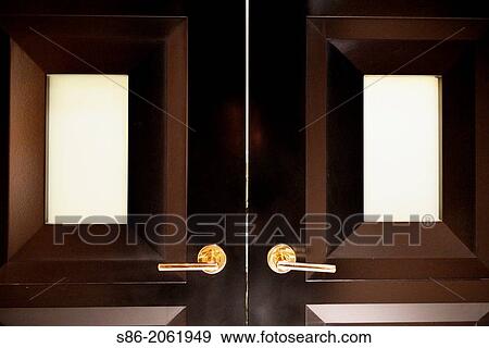 Closed Double Doors, Frosted Glass Panel Windows, Lights on Other Side, Las Vegas, NV, USA. View Large Photo Image Stock Photo - Closed Double Doors, Frosted Glass Panel Windows, Lights on Other Side, Las Vegas, NV, USA.. Fotosearch