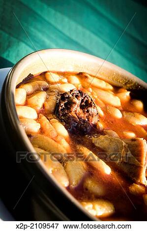 closeup of a plate with fabada asturiana, a typical spanish bean stew. View Large Photo Image Stock Photo - closeup of a plate with fabada asturiana, a typical spanish bean stew.. Fotosearch