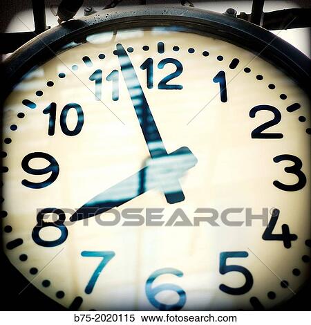 Closeup of a wall clock at eight o? clock. View Large Photo Image Stock Photography - Closeup of a wall clock at eight o? clock.. Fotosearch