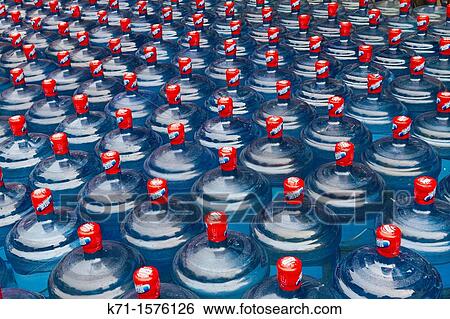 Closeup of drinking water bottles in Chengdu, Sechuan, China View Large Photo Image Stock Photograph - Closeup of drinking water bottles in Chengdu, Sechuan, China. Fotosearch