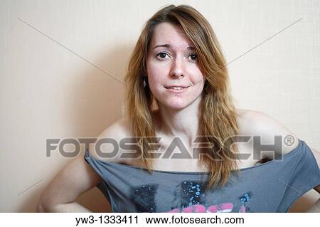 closeup of face of pretty girl against light wall View Large Photo Image Stock Image - closeup of face of pretty girl against light wall. Fotosearch
