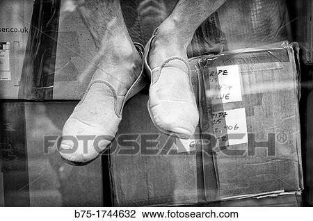 closeup of feet, unrecognizable person sitting on cardboard boxes, View Large Photo Image Stock Image - closeup of feet, unrecognizable person sitting on cardboard boxes,. Fotosearch