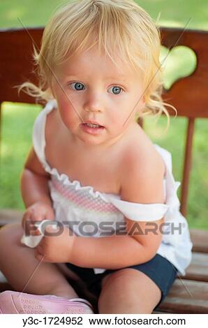 Closeup of female toddler between one and two years old View Large Photo Image Stock Image - Closeup of female toddler between one and two years old. Fotosearch