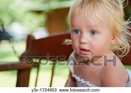 Closeup of female toddler between one and two years old View Large Photo Image Stock Image - Closeup of female toddler between one and two years old. Fotosearch