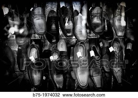 closeup of many Men shoes in a shoe shop window View Large Photo Image Stock Image - closeup of many Men shoes in a shoe shop window. Fotosearch