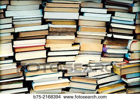 Picture - Closeup of used books stacked in a book shop in Els Encants market in Barcelona, Spain, Europe.. Fotosearch