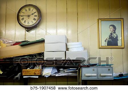 closeup of vintage office with portrait of Queen Elizabeth II View Large Photo Image Stock Photo - closeup of vintage office with portrait of Queen Elizabeth II. Fotosearch