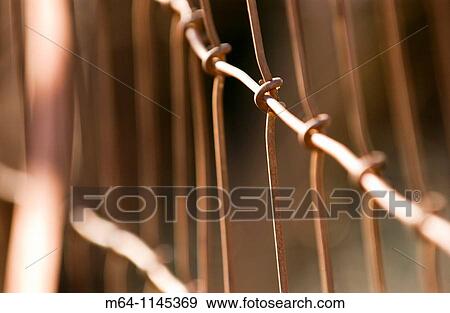 Closeup of wire fence View Large Photo Image Stock Photo - Closeup of wire fence. Fotosearch