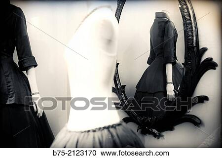 Closeup photograph of two mannequins and one seen through a mirror, in London, England, UK, Europe. View Large Photo Image Stock Image - Closeup photograph of two mannequins and one seen through a mirror, in London, England, UK, Europe.. Fotosearch