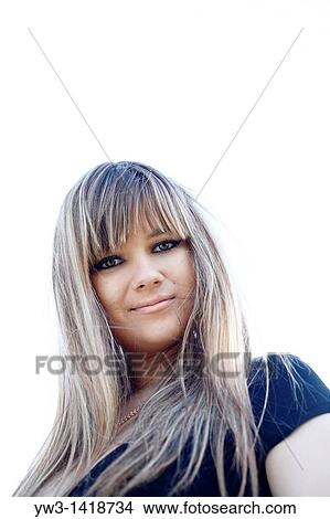 Closeup portrait of a beautiful 20-25 years happy woman in blur background outdoors View Large Photo Image Picture - Closeup portrait of a beautiful 20-25 years happy woman in blur background outdoors. Fotosearch