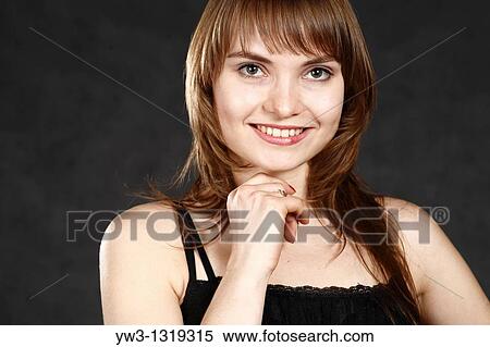closeup portrait of a young adult woman smiling View Large Photo Image Stock Photography - closeup portrait of a young adult woman smiling. Fotosearch