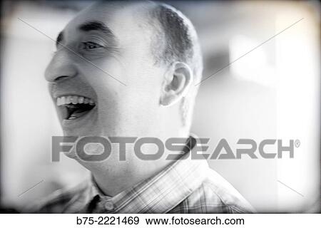 closeup Profile of a happy middle aged man, laughing out loud View Large Photo Image Stock Photo - closeup Profile of a happy middle aged man, laughing out loud. Fotosearch