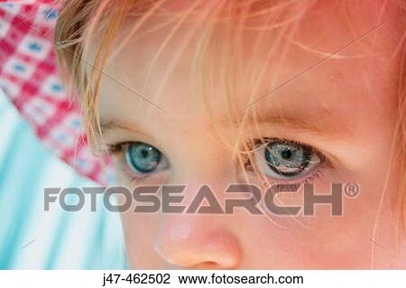 Closeup shot of big blue eyes View Large Photo Image Stock Image - Closeup shot of big blue eyes. Fotosearch