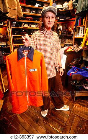 Stock Photo - Clothes for young people? BB Oil?. Rome. Italy.. Fotosearch