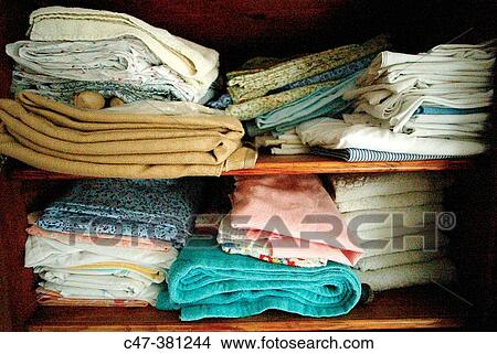 Picture - Clothes in the closet. Fotosearch