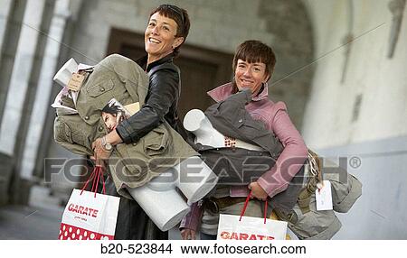 Clothes sellers with a mannequin. Retailers association. Elgoibar, Gipuzkoa, Euskadi. Spain. View Large Photo Image Picture - Clothes sellers with a mannequin. Retailers association. Elgoibar, Gipuzkoa, Euskadi. Spain.. Fotosearch