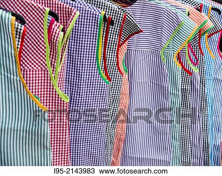 Clothing and household apparel on sale at a street market, Miravet, Spain. View Large Photo Image Stock Image - Clothing and household apparel on sale at a street market, Miravet, Spain.. Fotosearch