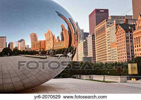 Stock Photo - Cloud Gate Sculpture or The Bean with downtown skyline reflected in polished surface Millennium Park in Chicago USA.. Fotosearch