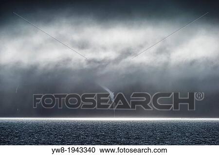 Clouds and Sun rays over the Greenland sea, Svalbard, Norway. View Large Photo Image Stock Image - Clouds and Sun rays over the Greenland sea, Svalbard, Norway.. Fotosearch