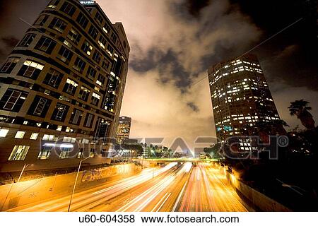 Cloudy night scene over freeway in downtown Los Angeles, California. USA. View Large Photo Image Stock Photo - Cloudy night scene over freeway in downtown Los Angeles, California. USA.. Fotosearch
