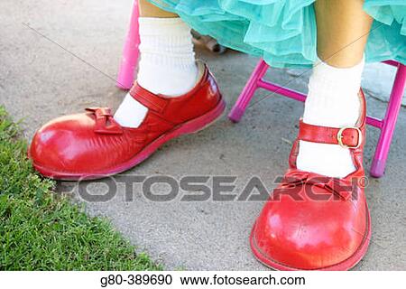 Stock Image - Clown's red shoes. Fotosearch