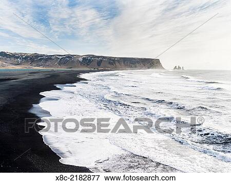 Coast of the North Atlantic near Vik y Myrdal during a winter storm. europe, northern europe, scandinavia, iceland, February. View Large Photo Image Stock Photo - Coast of the North Atlantic near Vik y Myrdal during a winter storm. europe, northern europe, scandinavia, iceland, February.. Fotosearch