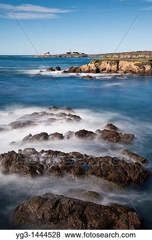 Coastal view towards Piedras Blancas lighthouse, San Simeon, California View Large Photo Image Stock Photo - Coastal view towards Piedras Blancas lighthouse, San Simeon, California. Fotosearch
