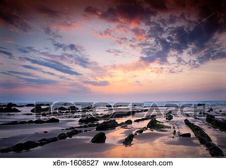 Coastline at sunset Barrika beach Biscay, Basque Country, Spain View Large Photo Image Stock Photo - Coastline at sunset Barrika beach Biscay, Basque Country, Spain. Fotosearch