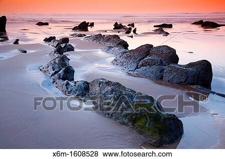 Coastline at sunset Barrika beach Biscay, Basque Country, Spain View Large Photo Image Stock Photo - Coastline at sunset Barrika beach Biscay, Basque Country, Spain. Fotosearch
