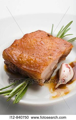 Stock Image - Cochinillo asado, Restaurante Amparito Roca, Guadalajara, Castilla la Mancha, Spain, Cocineros Eugenio Collado y Jess Velasco. Fotosearch