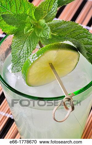 cocktail with lime slice and mint leaves, mojito View Large Photo Image Stock Image - cocktail with lime slice and mint leaves, mojito. Fotosearch