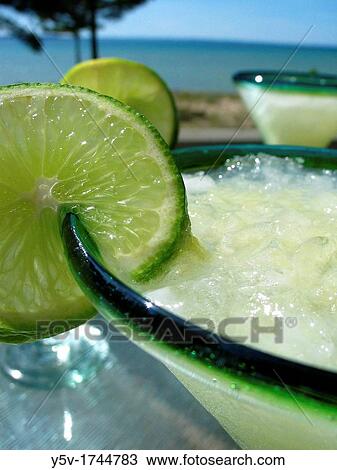 Stock Image - Cocktails before dinner. Fotosearch