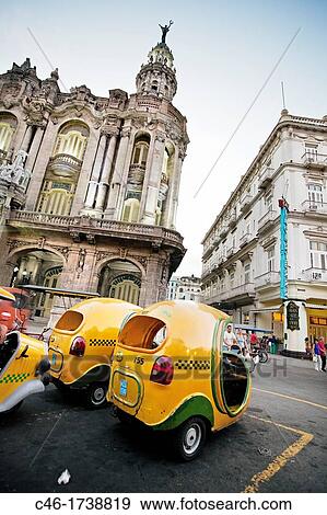 Coco taxis, Centro Gallego, Centro Havana, La Havana, Cuba. View Large Photo Image Stock Photo - Coco taxis, Centro Gallego, Centro Havana, La Havana, Cuba.. Fotosearch