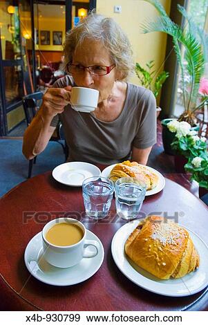 Coffee break in Cafe Esplanade along Esplanade boulevard in central Helsinki Finland Eurpe View Large Photo Image Stock Photo - Coffee break in Cafe Esplanade along Esplanade boulevard in central Helsinki Finland Eurpe. Fotosearch
