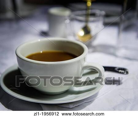 Coffee cup on table. View Large Photo Image Stock Image - Coffee cup on table.. Fotosearch