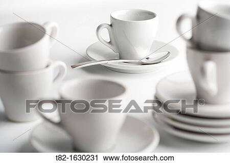 coffee cups and saucers of white on white porcelain View Large Photo Image Stock Image - coffee cups and saucers of white on white porcelain. Fotosearch
