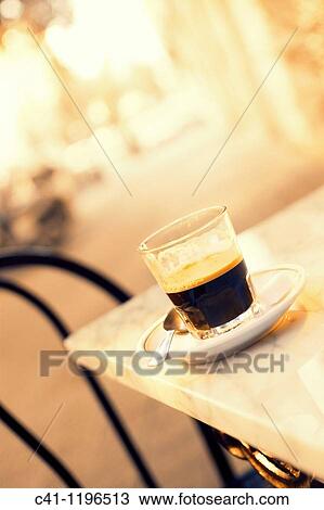 Stock Image - coffee in a table. Fotosearch