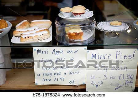 coffee shop counter with mince pies and apple and cherrie pies View Large Photo Image Picture - coffee shop counter with mince pies and apple and cherrie pies. Fotosearch