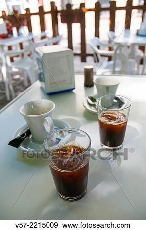 Coffee with ice in a terrace. View Large Photo Image Stock Photo - Coffee with ice in a terrace.. Fotosearch