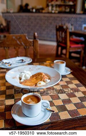 Coffee with torrija for breakfast. Chinchon, Madrid province, Spain. View Large Photo Image Stock Image - Coffee with torrija for breakfast. Chinchon, Madrid province, Spain.. Fotosearch