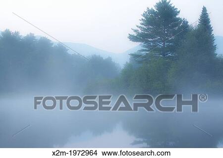 Coffin Pond in Sugar Hill, New Hampshire USA at morning blue hour during the summer months. View Large Photo Image Picture - Coffin Pond in Sugar Hill, New Hampshire USA at morning blue hour during the summer months.. Fotosearch
